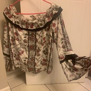 Beautiful off the shoulder blouse. Excellent condition.